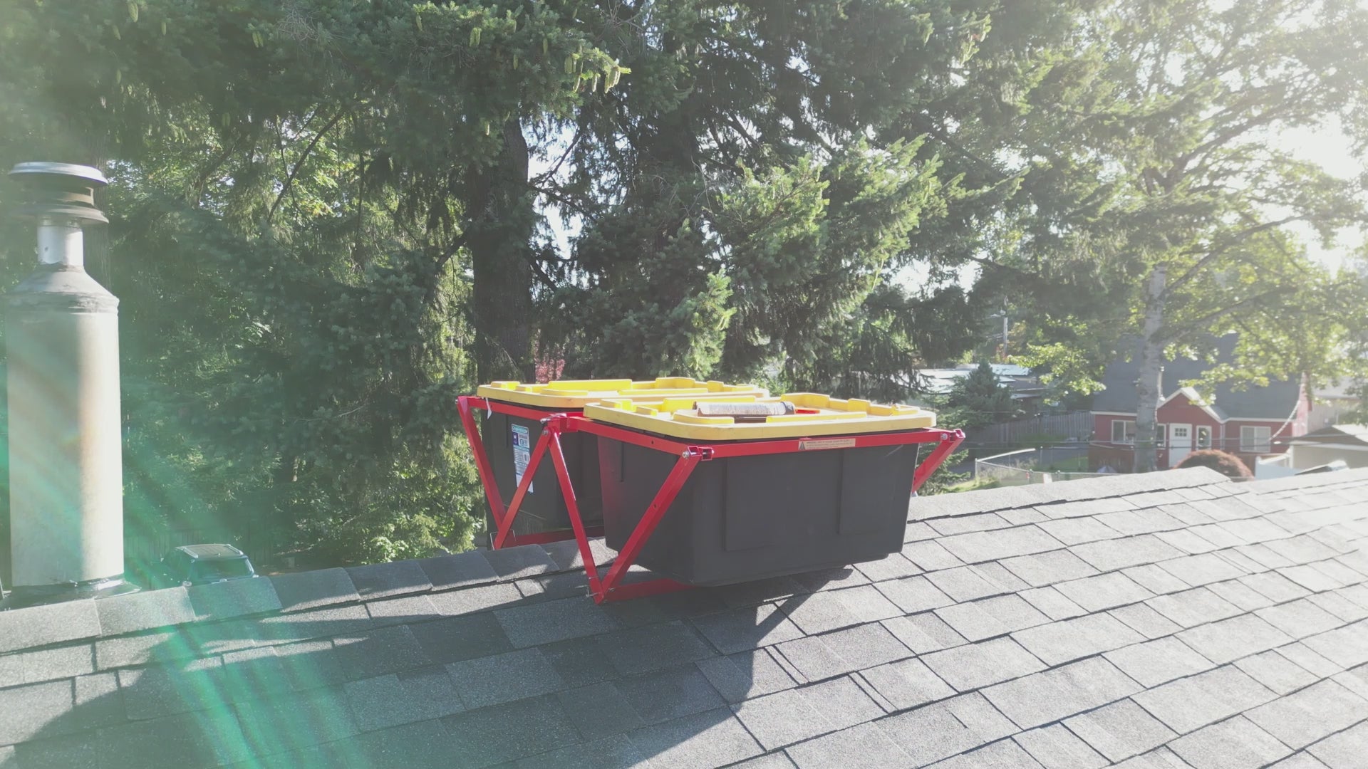 Drone footage of Roof Buck on roof with bins installed